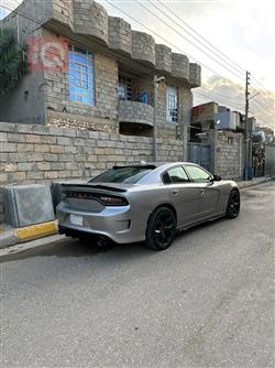 دۆج چارجەر